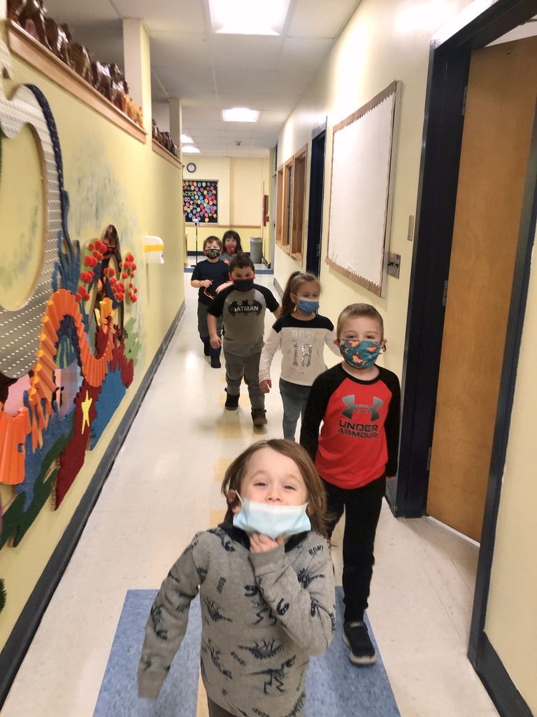 walking through the school on our gingerbread man hunt!