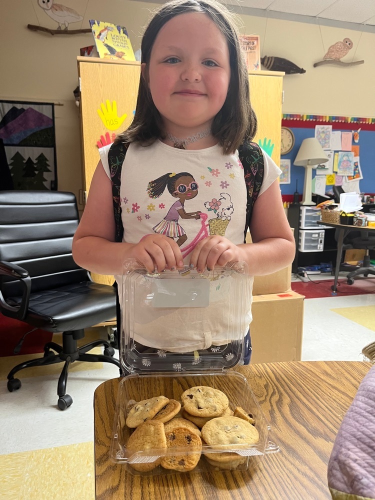 girl with a box of cookies